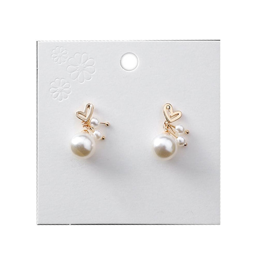 Heart and pearl ear studs